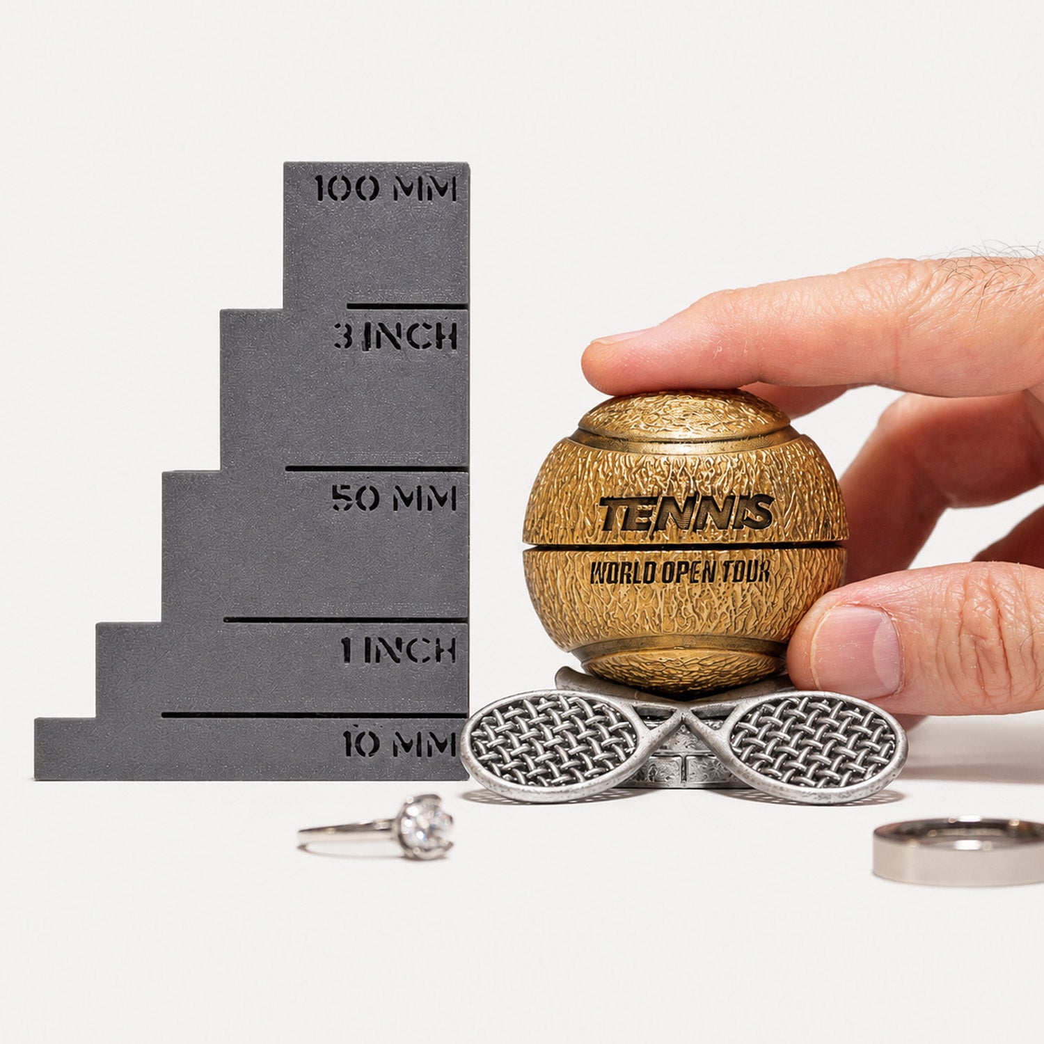 all-groups Size comparison of Tennis Ball Ring Box next to ruler