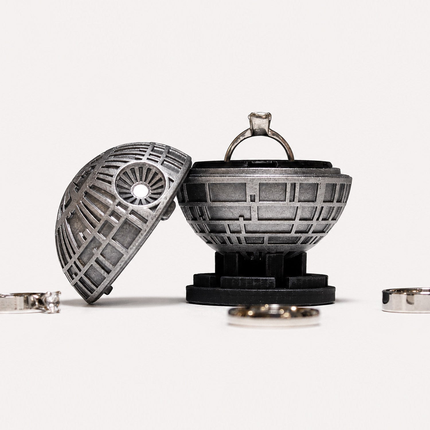 all-groups Black Star Ring Box open with engagement ring inside