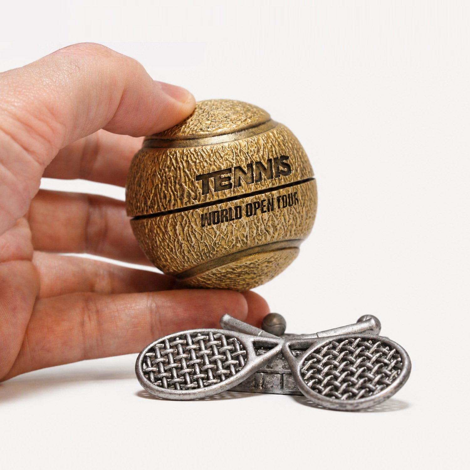 all-groups Front view of Tennis Ball Ring Box showing detailed design in hand